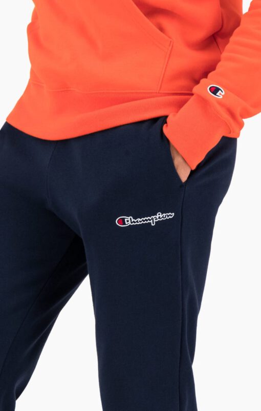 Pantalón Chándal CHAMPION Hombre CUFFED SCRIPT LOGO EMBROIDERY FLEECE JOGGERS Ref. 214724 Azul marino