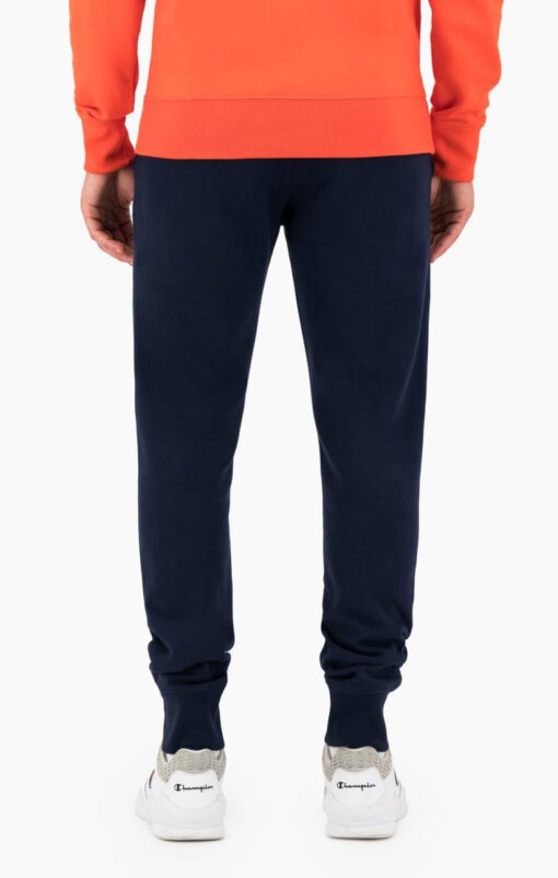 Pantalón Chándal CHAMPION Hombre CUFFED SCRIPT LOGO EMBROIDERY FLEECE JOGGERS Ref. 214724 Azul marino