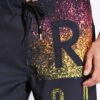 Bañador RIP CURL surfero niño Short elástico OVERSPRAY 18 S/E Yelow Ref. KBOBU4 negro multicolor