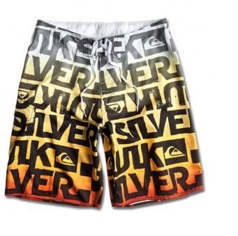 Bañador QUIKSILVER Short surfero niño elástico Stained Youth red Ref. KRBBS153 amarillo/rojo logos