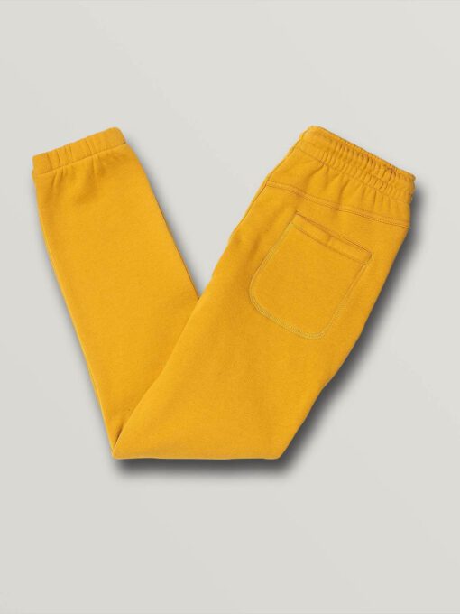 Pantalón chándal VOLCOM niño de forro jogger DEADLY STONES FLEECE Ref. C1212002 amarillo logos pierna