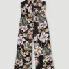 Mono fluido ONEILL niña pierna ancha JUMPSUIT Ref. 3300002 Negro flores tropical