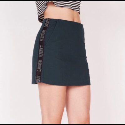 Mini Falda OBEY de Talle Alto para Mujer Noa Skirt sage Ref. 411550067 verde franja logos lateral